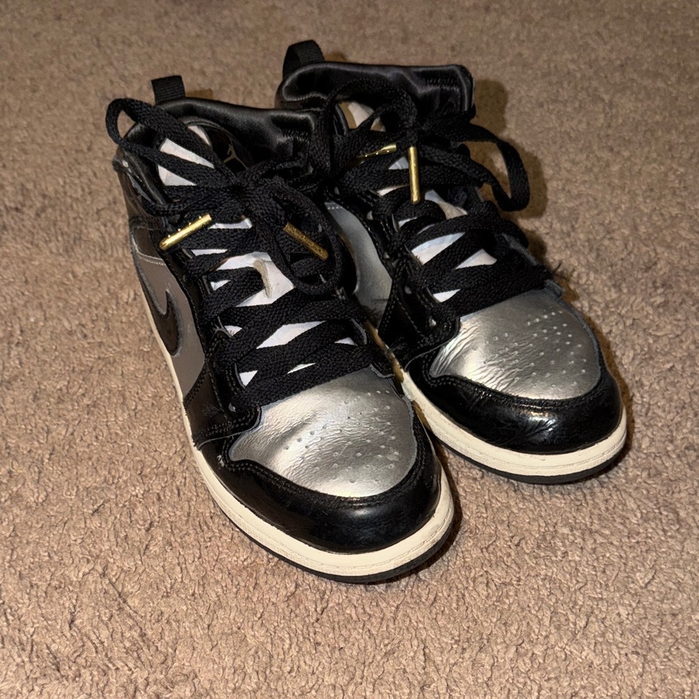 Kids Black and Silver Jordan 1s
